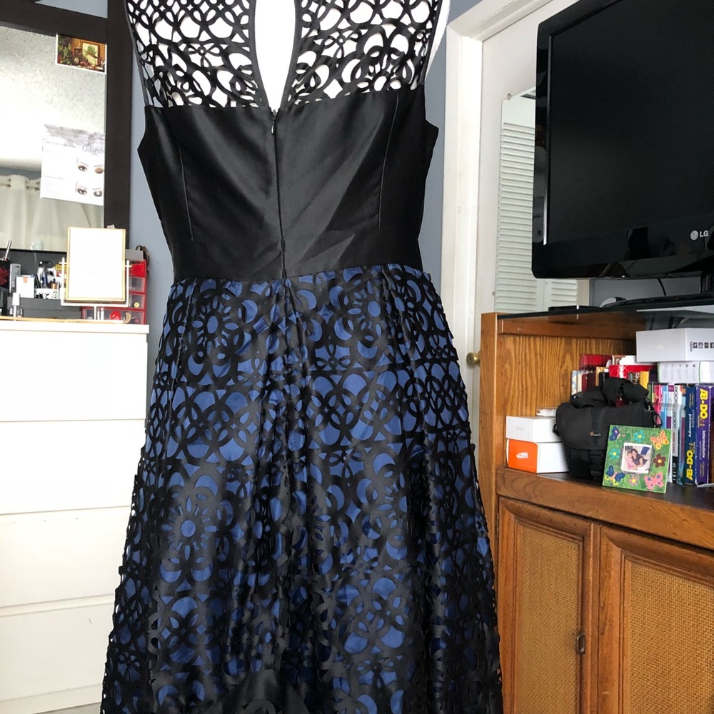 Black dress with laser cut detail - Picture 5 of 8